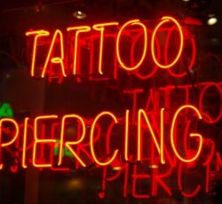 Tats And Piercing neon sign